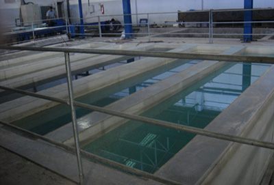 Cement solution tanks for chemical cleaning