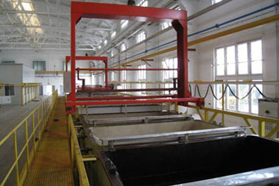 Stainless steel immersion tank with overhead crane
